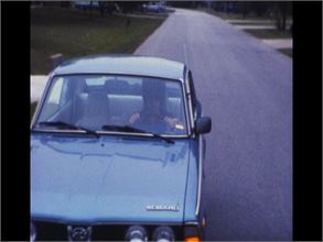 FRAME-MAD-MAN-AT-WHEEL.bmp